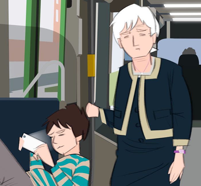 niño jugando despreocupado con su móvil en el tranvía, mientras su amama tiene ir de pie
